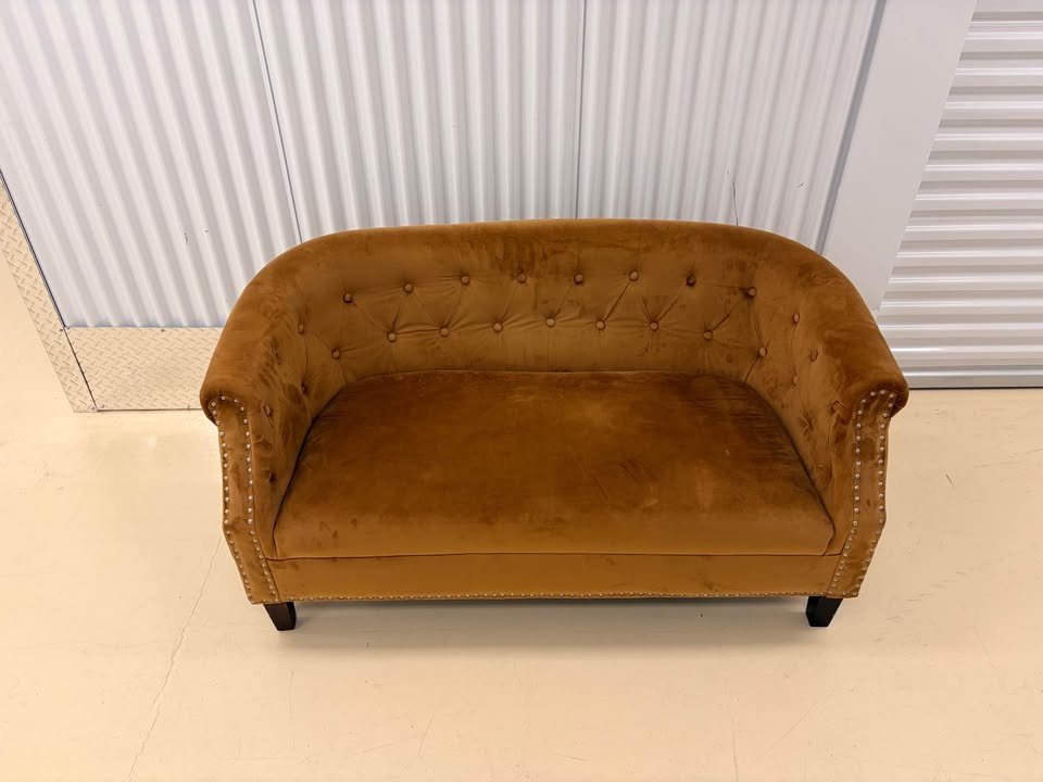 Tufted Gold Loveseat
