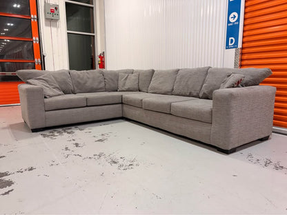 Huge Grey Sectional with Throw Cushions