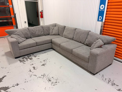 Huge Grey Sectional with Throw Cushions