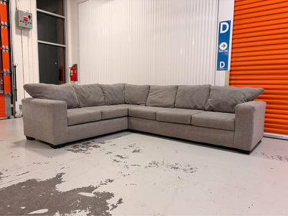 Huge Grey Sectional with Throw Cushions