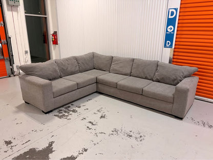 Huge Grey Sectional with Throw Cushions